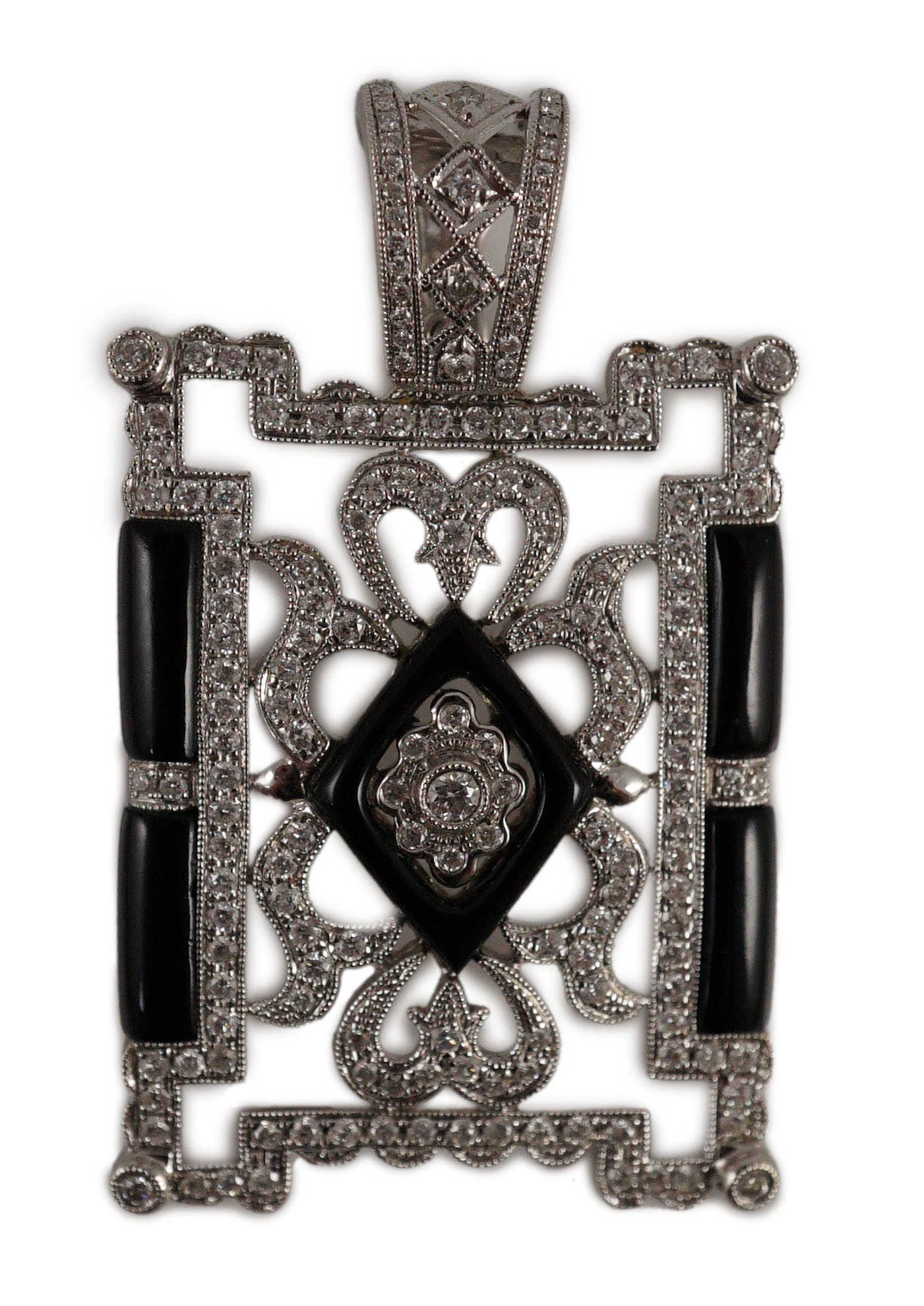A modern 1920's style pierced 18k white gold, diamond and black onyx set rectangular pendant